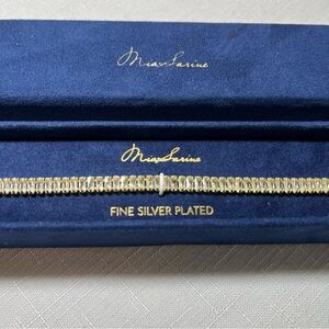 New. MIA SARINE Fine Silver Plated Tennis Bracelet in Blue Box. Gold tone NIB